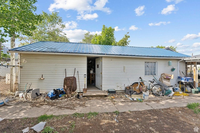 142 N Pinehurst Ave, Tooele, UT 84074 - rear view of house with metal roof