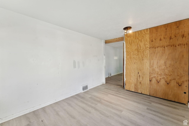 142 N Pinehurst Ave, Tooele, UT 84074 - empty room featuring wood finished floors and baseboards