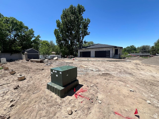 7230 S 525 E, Midvale, UT 84047 - view of yard featuring a garage and an outdoor structure