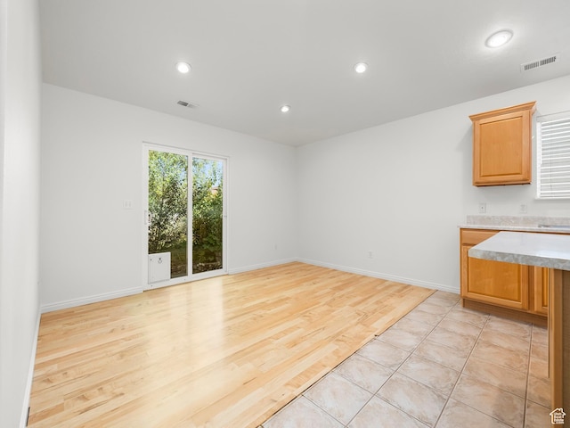 94 N 2830 W, Provo, UT 84601 - empty room with light wood-style flooring, recessed lighting, and baseboards