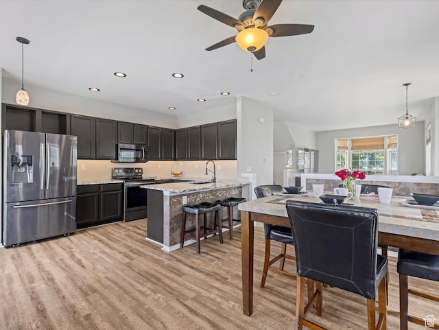955 E Senior Band, Draper, UT 84020 - dining area with light wood-style floors, a ceiling fan, and recessed lighting