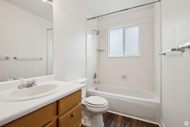3018 S Leland Cv, South Salt Lake, UT 84106 - bathroom featuring toilet, shower / bathtub combination, vanity, and wood finished floors
