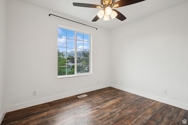 3018 S Leland Cv, South Salt Lake, UT 84106 - empty room with healthy amount of natural light, wood finished floors, baseboards, and a ceiling fan