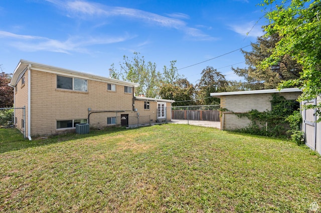4314 S 615 E, Millcreek, UT 84107 - back of property with central AC and brick siding