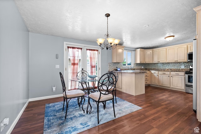 4314 S 615 E, Millcreek, UT 84107 - dining area with a chandelier, dark wood-style floors, baseboards, and a textured ceiling