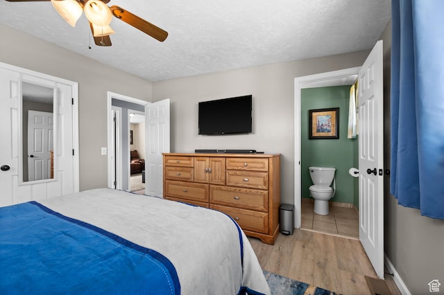 4314 S 615 E, Millcreek, UT 84107 - bedroom featuring light wood-style flooring, a textured ceiling, ensuite bath, ceiling fan, and baseboards