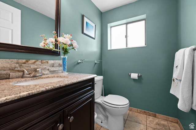 4314 S 615 E, Millcreek, UT 84107 - bathroom featuring toilet, vanity, and baseboards