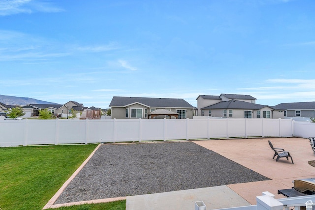 1460 E Lowe Peak Dr, Eagle Mountain, UT 84005 - view of yard with a residential view and a patio area