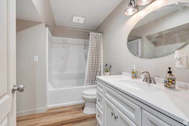 1460 E Lowe Peak Dr, Eagle Mountain, UT 84005 - full bathroom with wood finished floors, vanity, toilet, and shower / tub combo with curtain
