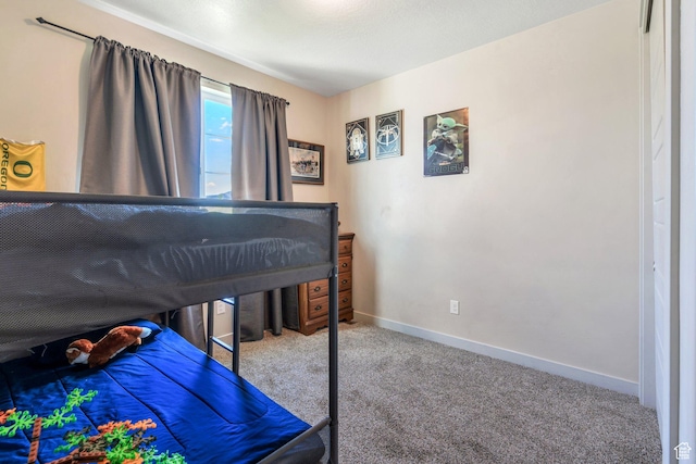 1460 E Lowe Peak Dr, Eagle Mountain, UT 84005 - carpeted bedroom with baseboards