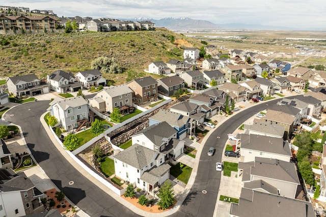 242 E Ridgeline Way N, Salt Lake, UT 84054 - aerial view of property and surrounding area featuring nearby suburban area and a mountainous background
