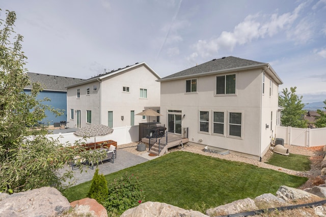 242 E Ridgeline Way N, Salt Lake, UT 84054 - rear view of property with a patio, stucco siding, a wooden deck, and a gate
