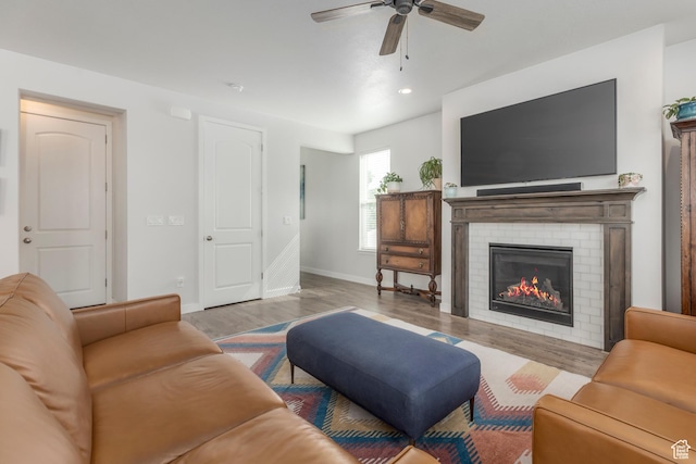 242 E Ridgeline Way N, Salt Lake, UT 84054 - living area featuring baseboards, ceiling fan, wood finished floors, a fireplace, and recessed lighting