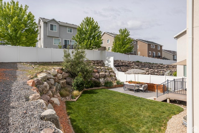 242 E Ridgeline Way N, Salt Lake, UT 84054 - view of yard featuring a residential view, a patio, and an outdoor hangout area