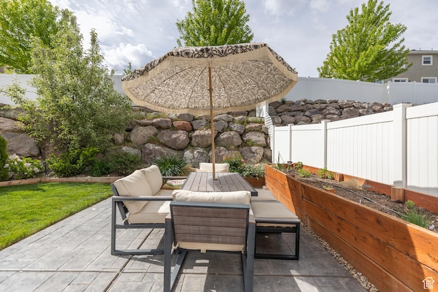 242 E Ridgeline Way N, Salt Lake, UT 84054 - fenced backyard featuring a patio area and outdoor lounge area