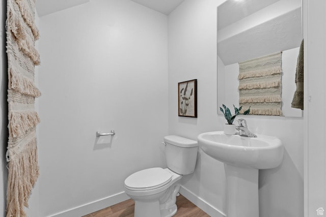 1261 N 375 E Unit 155, Harrisville, UT 84404 - bathroom with wood finished floors, baseboards, and toilet