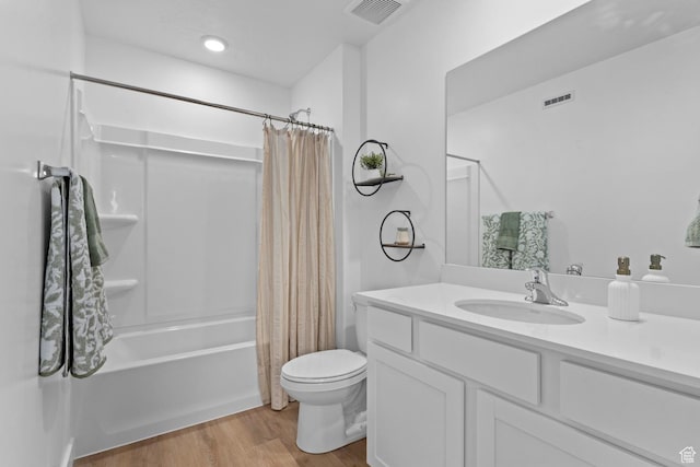 1261 N 375 E Unit 155, Harrisville, UT 84404 - bathroom with wood finished floors, shower / bath combination with curtain, toilet, and vanity