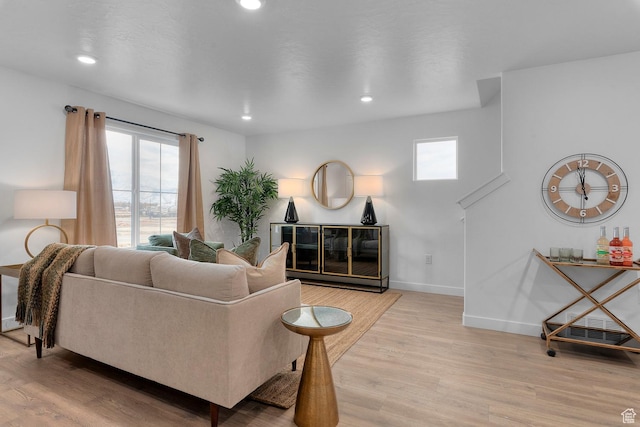 1261 N 375 E Unit 155, Harrisville, UT 84404 - living room with light wood-style floors, baseboards, and recessed lighting