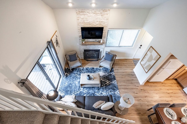 2025 S Canyon Resort Dr Unit F-8, Park City, UT 84098 - living area featuring wood finished floors, a fireplace, and baseboards