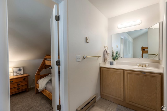 2025 S Canyon Resort Dr Unit F-8, Park City, UT 84098 - bathroom with baseboard heating, lofted ceiling, and vanity