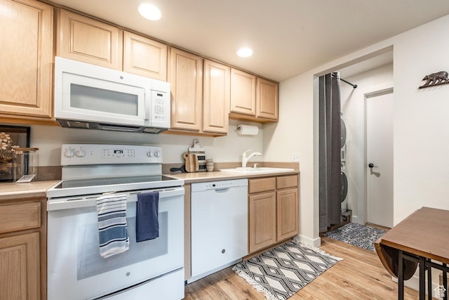 2025 S Canyon Resort Dr Unit F-8, Park City, UT 84098 - kitchen with white appliances, light brown cabinets, a sink, light wood-style flooring, and light countertops