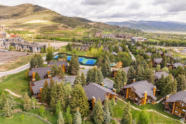 2025 S Canyon Resort Dr Unit F-8, Park City, UT 84098 - aerial view of property and surrounding area with nearby suburban area and a mountain backdrop
