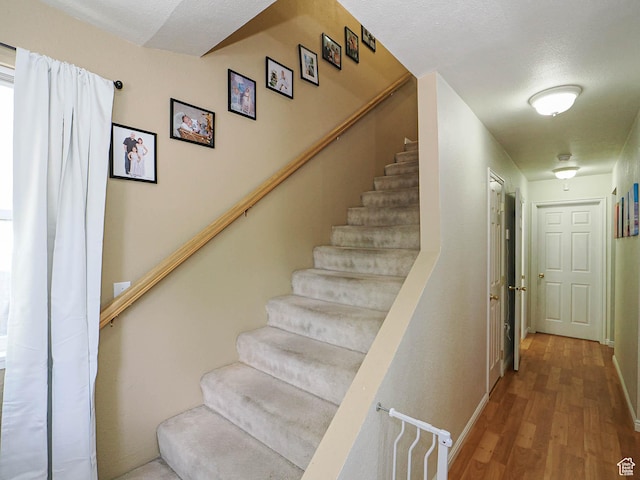 787 W Lennox St S, Midvale, UT 84047 - stairway with wood finished floors and baseboards