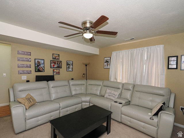 787 W Lennox St S, Midvale, UT 84047 - carpeted living room featuring ceiling fan, baseboards, and a textured ceiling