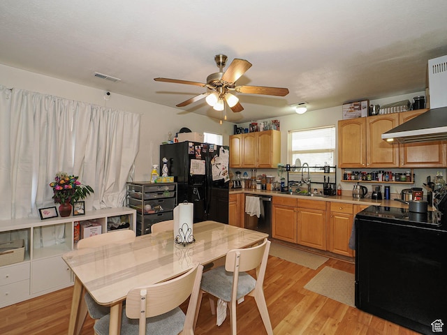 787 W Lennox St S, Midvale, UT 84047 - kitchen featuring black appliances, light wood-style floors, a ceiling fan, light countertops, and a sink