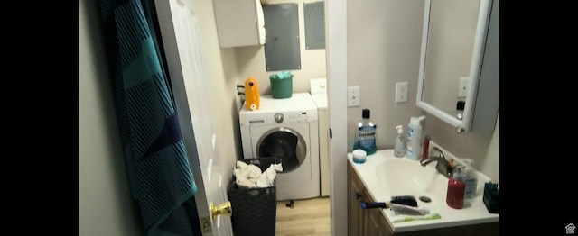 1004 N Sir Michael Dr, Salt Lake City, UT 84116 - laundry room featuring washer / clothes dryer and light wood-type flooring