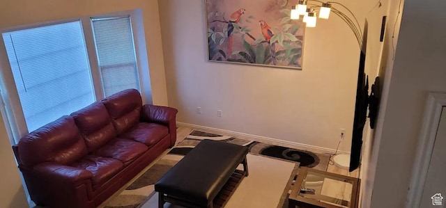 1004 N Sir Michael Dr, Salt Lake City, UT 84116 - living room featuring a chandelier and baseboards