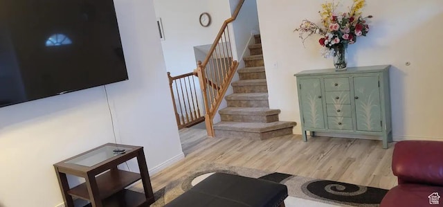 1004 N Sir Michael Dr, Salt Lake City, UT 84116 - stairs with wood finished floors and baseboards
