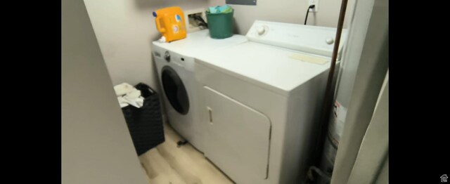 1004 N Sir Michael Dr, Salt Lake City, UT 84116 - washroom with washer and dryer