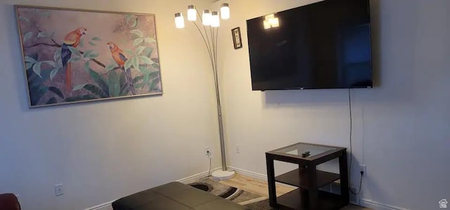 1004 N Sir Michael Dr, Salt Lake City, UT 84116 - living area featuring baseboards and wood finished floors