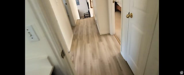1004 N Sir Michael Dr, Salt Lake City, UT 84116 - hallway featuring light wood-style flooring