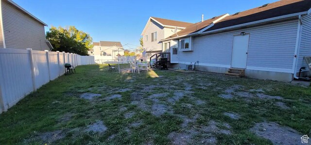 1004 N Sir Michael Dr, Salt Lake City, UT 84116 - view of yard featuring entry steps and central air condition unit