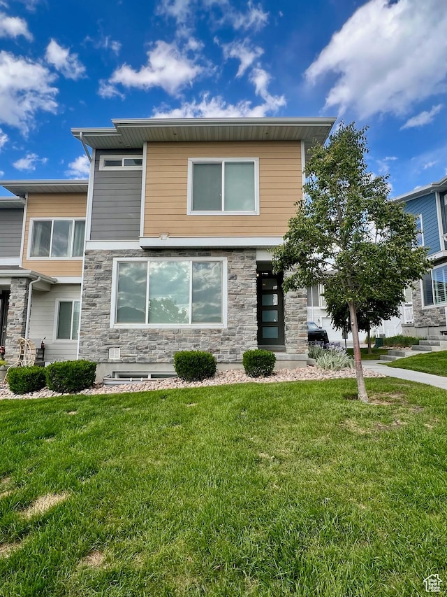 15456 S Navy Trails Ln W, Bluffdale, UT 84065 - contemporary home featuring stone siding and a front lawn