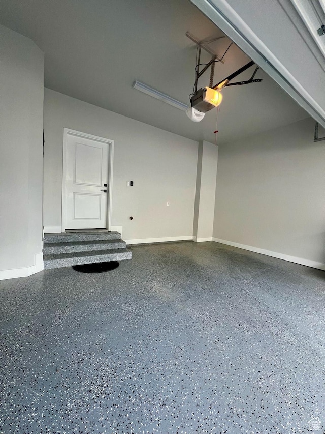 15456 S Navy Trails Ln W, Bluffdale, UT 84065 - garage with baseboards and a garage door opener
