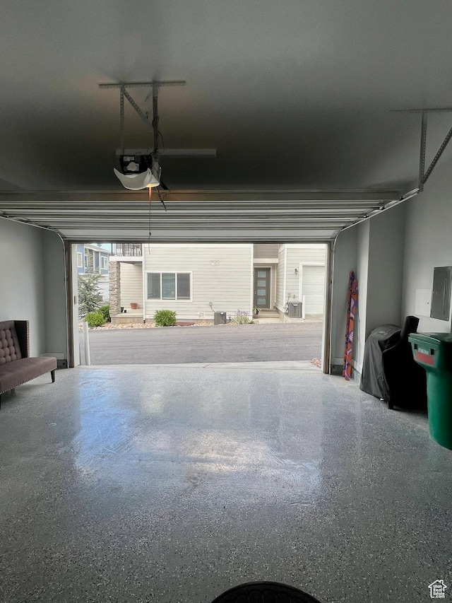 15456 S Navy Trails Ln W, Bluffdale, UT 84065 - garage with a garage door opener and electric panel