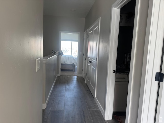 15456 S Navy Trails Ln W, Bluffdale, UT 84065 - hallway with dark wood-type flooring and baseboards