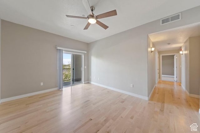 1134 E 3300th St S Unit 416, Salt Lake City, UT 84106 - empty room featuring ceiling fan, light wood finished floors, and baseboards