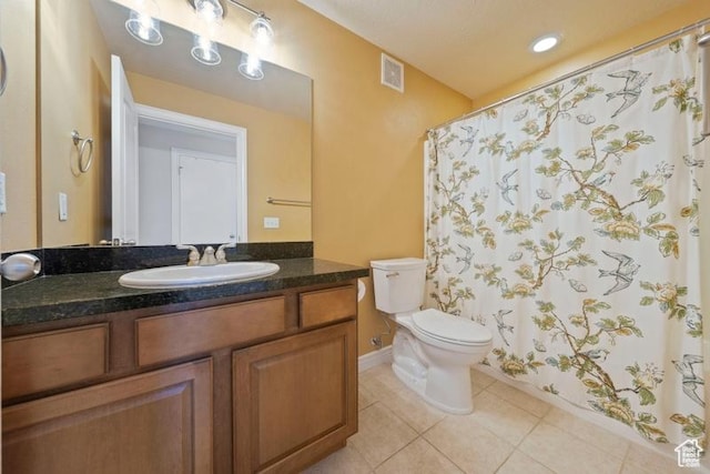 1134 E 3300th St S Unit 416, Salt Lake City, UT 84106 - bathroom with toilet, tile patterned flooring, vanity, a shower with shower curtain, and baseboards