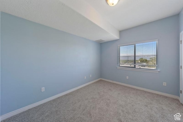 1134 E 3300th St S Unit 416, Salt Lake City, UT 84106 - empty room with carpet flooring and baseboards
