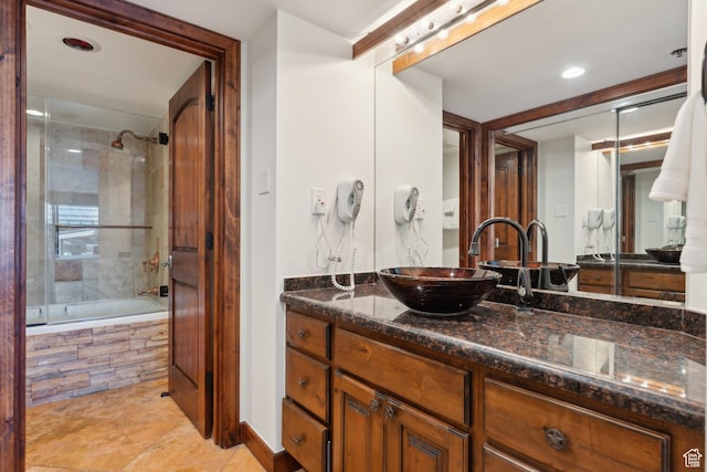 1485 Empire Ave Unit 201, Park City, UT 84060 - bathroom with vanity, tiled shower / bath combo, tile patterned floors, and recessed lighting