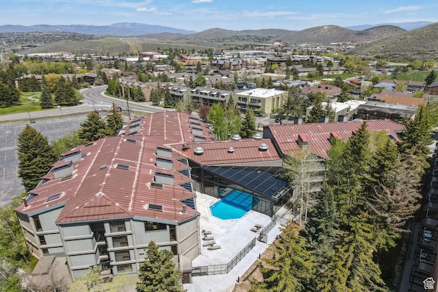 1485 Empire Ave Unit 201, Park City, UT 84060 - drone / aerial view of a mountain backdrop and a pool area