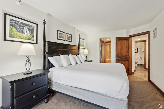 1485 Empire Ave Unit 201, Park City, UT 84060 - bedroom with carpet flooring, connected bathroom, and baseboards