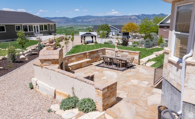 954 E 960 S, Ephraim, UT 84627 - view of patio / terrace with a gazebo, a mountain view, and outdoor dining space