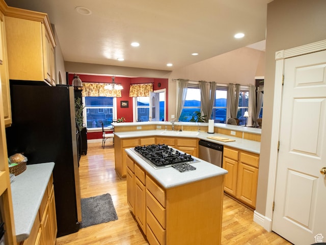 954 E 960 S, Ephraim, UT 84627 - kitchen featuring stainless steel appliances, light brown cabinets, light countertops, light wood finished floors, and a sink