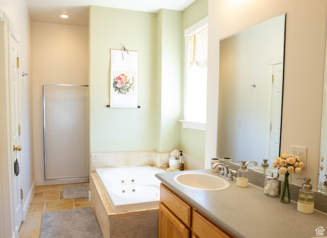 954 E 960 S, Ephraim, UT 84627 - bathroom featuring a stall shower, a whirlpool tub, and vanity