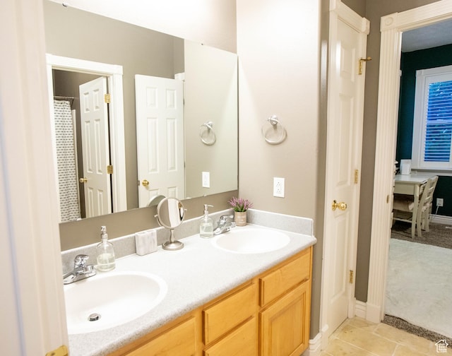 954 E 960 S, Ephraim, UT 84627 - bathroom featuring double vanity, tile patterned flooring, and baseboards